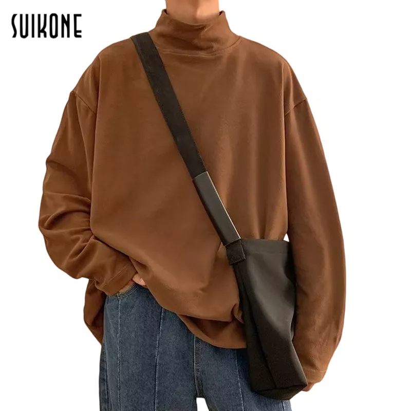 Suikone เสื้อยืดผู้ชายแขนยาวแฟชั่นสีทึบเรียบง่ายครึ่งคอสูงเสื้อสเวตเตอร์ให้ความอบอุ่นสามารถสวมใส่ได้ทั้งชายและหญิง
