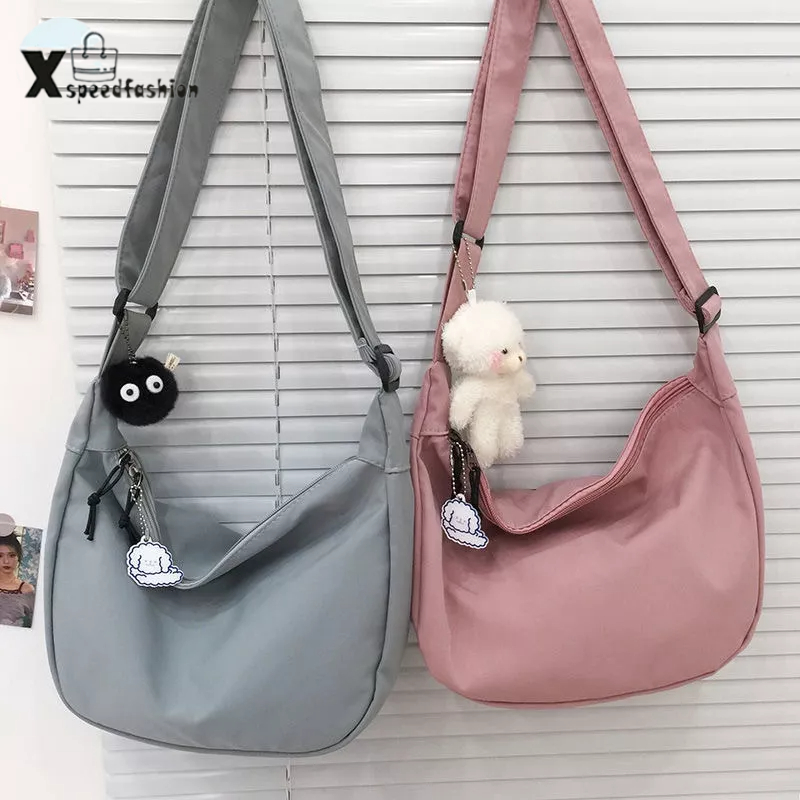 xspeedfashion(X1832) กระเป๋าสะพายข้าง สีพื้น ผ้าไนล่อน สไตล์เกาหลี(ไม่มีที่ห้อยแถม)
