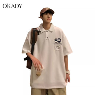 OKADY อารมณ์ของผู้ชายเสื้อโปโลญี่ปุ่นฤดูร้อนแขนห้าส่วนเทรนด์แฟชั่นยอดนิยมยอดนิยมของเยาวชน