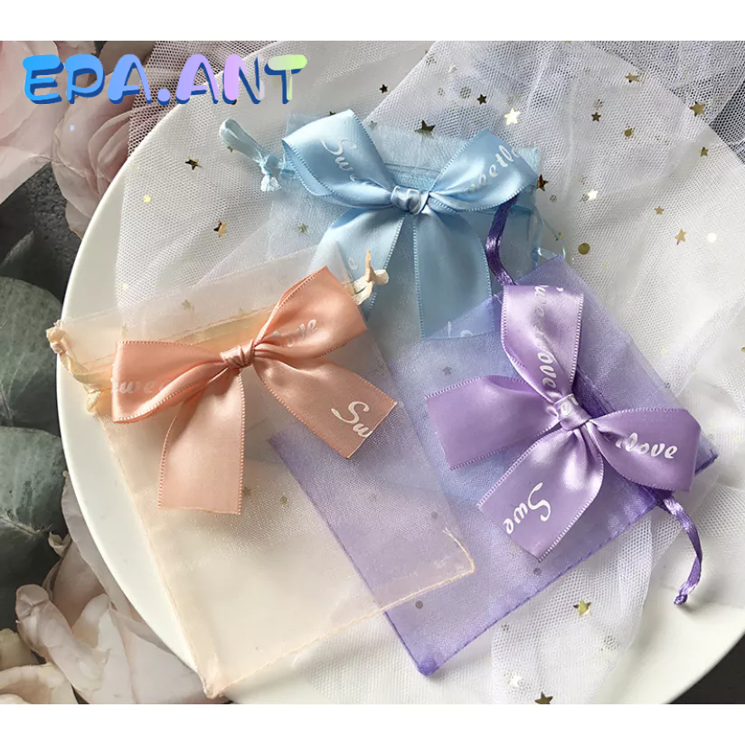 ถุงผ้าแก้วโปร่งใส่ ด้านหน้าผูกโบว์ ถุงผ้าหูรูด มีหลายสีพร้อมส่ง