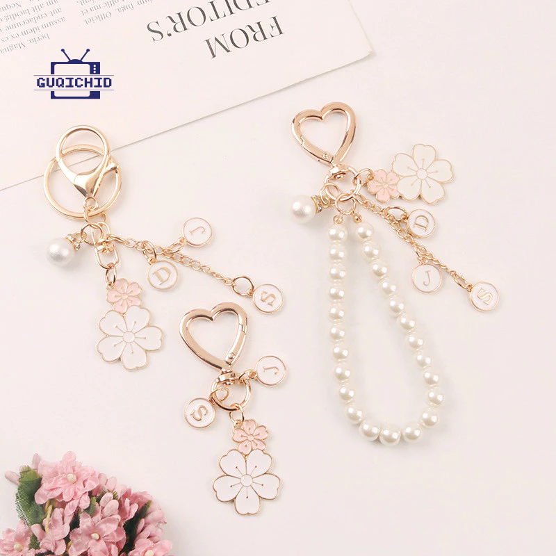สายคล้องโทรศัพท์มือถือ จี้โทรศัพท์โลหะรูปดอกไม้คู่ จี้กล่องหูฟังไข่มุกตัวอักษรน่ารัก จี้กระเป๋าสุดสร้างสรรค์ พวงกุญแจ - รูปที่ 4