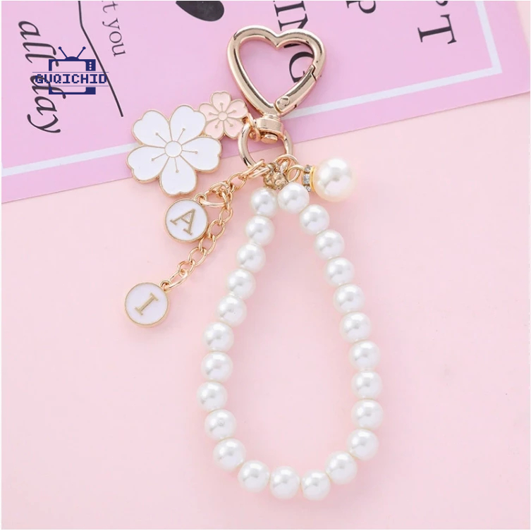 สายคล้องโทรศัพท์มือถือ จี้โทรศัพท์โลหะรูปดอกไม้คู่ จี้กล่องหูฟังไข่มุกตัวอักษรน่ารัก จี้กระเป๋าสุดสร้างสรรค์ พวงกุญแจ - รูปที่ 2