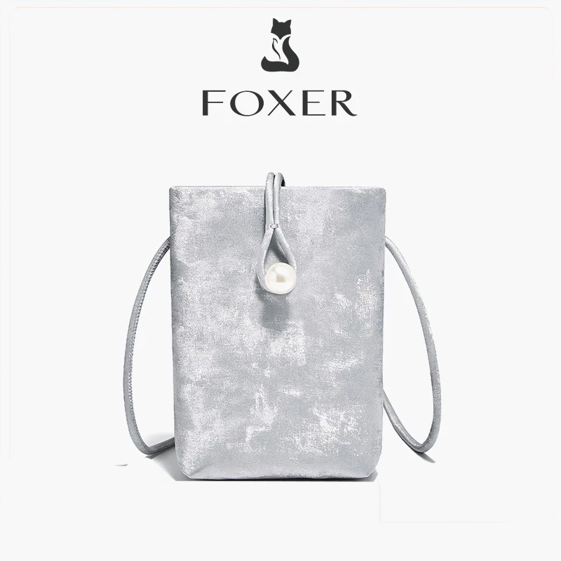 FOXER กระเป๋าสะพายข้างผู้หญิง กระเป๋าใส่โทรศัพท์ทรงน่ารักขนาดเล็ก กระเป๋าสะพายทรงถังสีเงิน