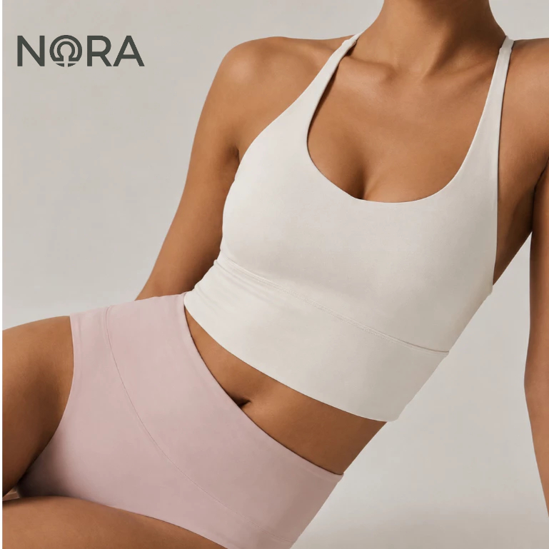 NORA สปอร์ตบราผู้หญิง สายไขว้ ฟองน้ำติดใน ผ้านุ่ม ยืดหยุ่นสูง เก็บกระชับ สำหรับโยคะ พิลาทิส ใส่ทุกวัน