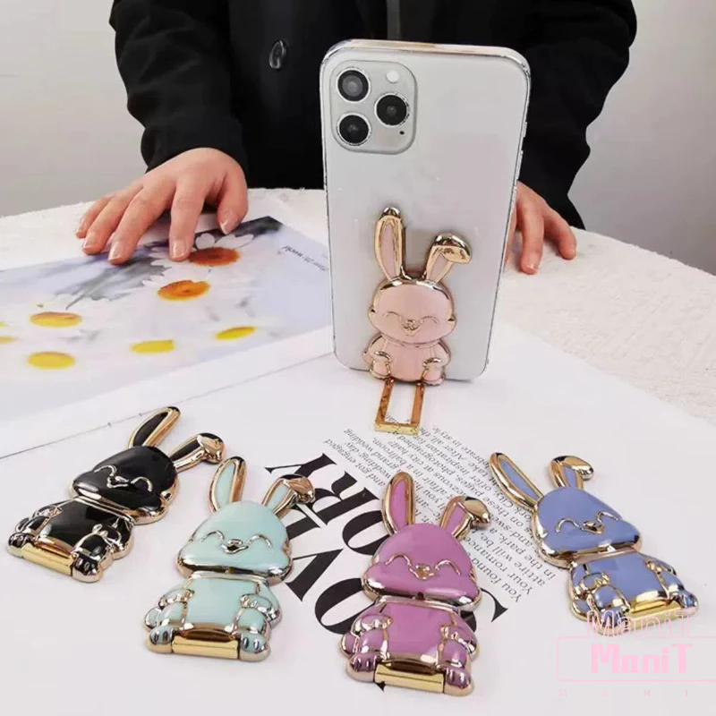 ที่วางโทรศัพท์มือถือ ลายการ์ตูนกระต่าย สามารถจับคู่กับโทรศัพท์มือถือทุกรุ่น แบบสติกเกอร์ พับได้ แบบสร้างสรรค์ Kickstand ราคา ถูกที่สุด ดีลบีเคเค