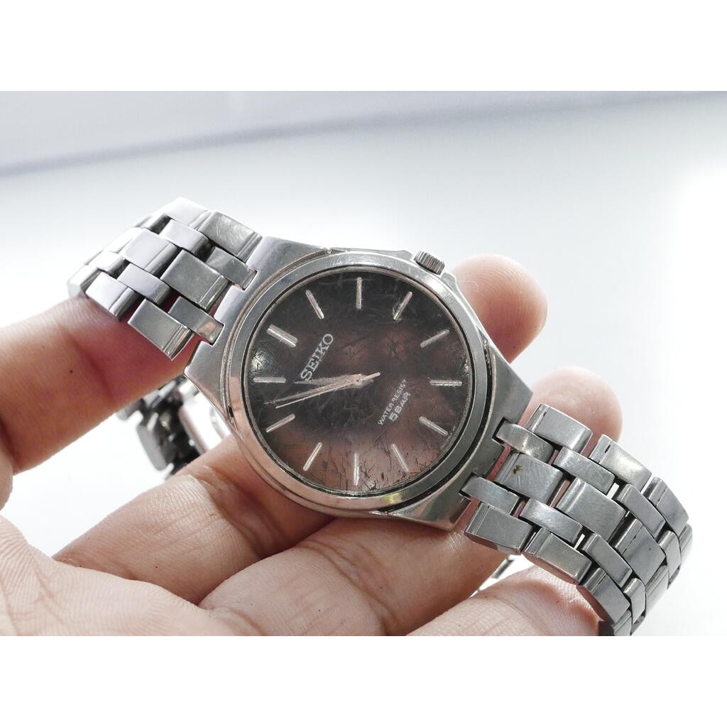 นาฬิกา Vintage มือสองญี่ปุ่น Seiko 7N01 0DM0 หน้าปัดสีดำ ผู้ชาย Quartz Integrated Bracelet 35mm