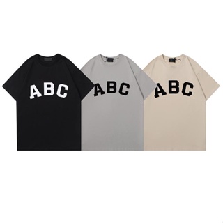 พร้อมส่ง เสื้อยืดแขนสั้น คอกลม พิมพ์ลายตัวอักษร FOG FEAR OF GOD ESSENTIALS ABC สําหรับผู้ชาย