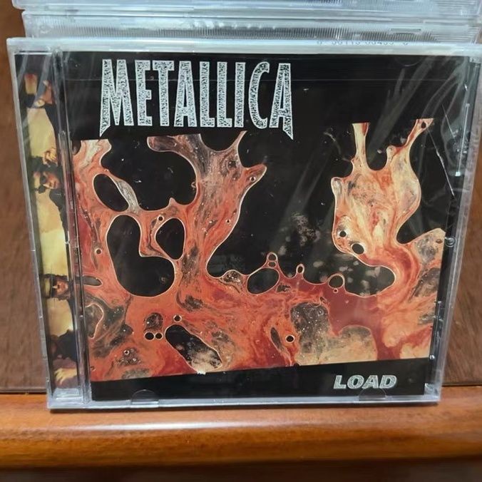 การประมวลผลสต็อกรุ่น US ที่ยังไม่ได้เปิด Metallica Load Metal Band CD AA39