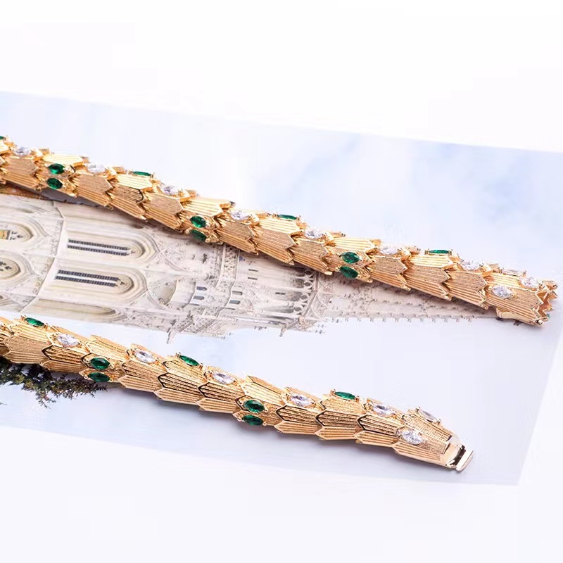 สร้อยคอ สร้อยข้อมือ แหวน ต่างหู รูปงู ชุบทอง ยืดหยุ่น สไตล์ยุโรป และอเมริกา แฟชั่นสําหรับผู้หญิง
