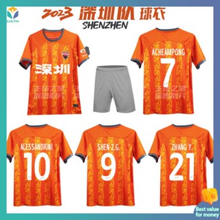 เสื้อบอลแมนยู เสื้อบอลแขนยาว 2023ใหม่ไชนีสซูเปอร์ลีกเซินเจิ้นทีมเหย้าสีส้มเสื้อแขนสั้นเสื้อแฟนเสื้อฝึก Kaisa เครื่องแบบฟุตบอล