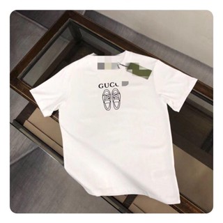 Gucci เสื้อยืดลําลอง ผ้าฝ้าย แขนสั้น พิมพ์ลายโลโก้ ทรงหลวม เหมาะกับฤดูร้อน สําหรับผู้ชาย และผู้หญิง