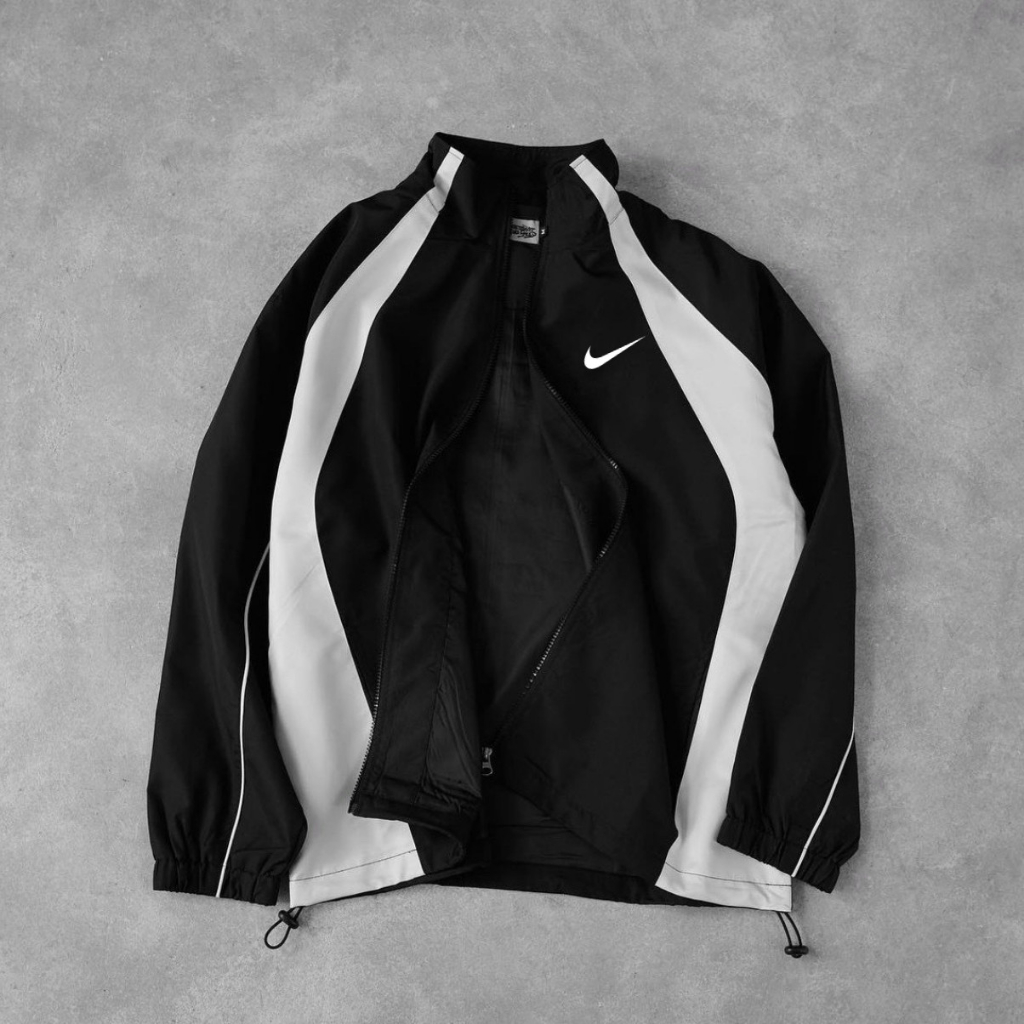 เสื้อแจ็คเก็ต Nike เสื้อแจ็คเก็ตร่มชูชีพกันลม 2 ชั้นของแท้คุณภาพสูงสําหรับผู้ชายและผู้หญิงแบบมาตรฐาน