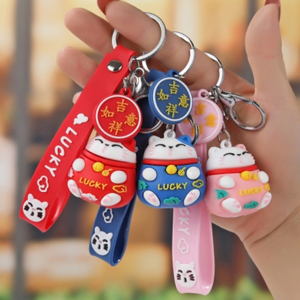 พวงกุญแจแมวนําโชคและพวงกุญแจรูบิค LMS
