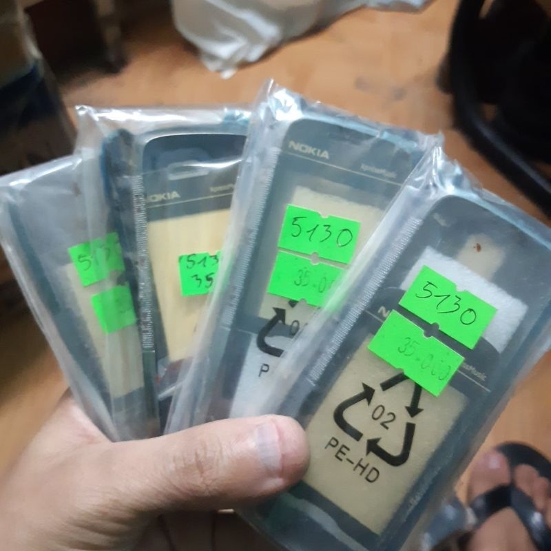 ชุดเคสโทรศัพท์ nokia 5130 สีดําของแท้