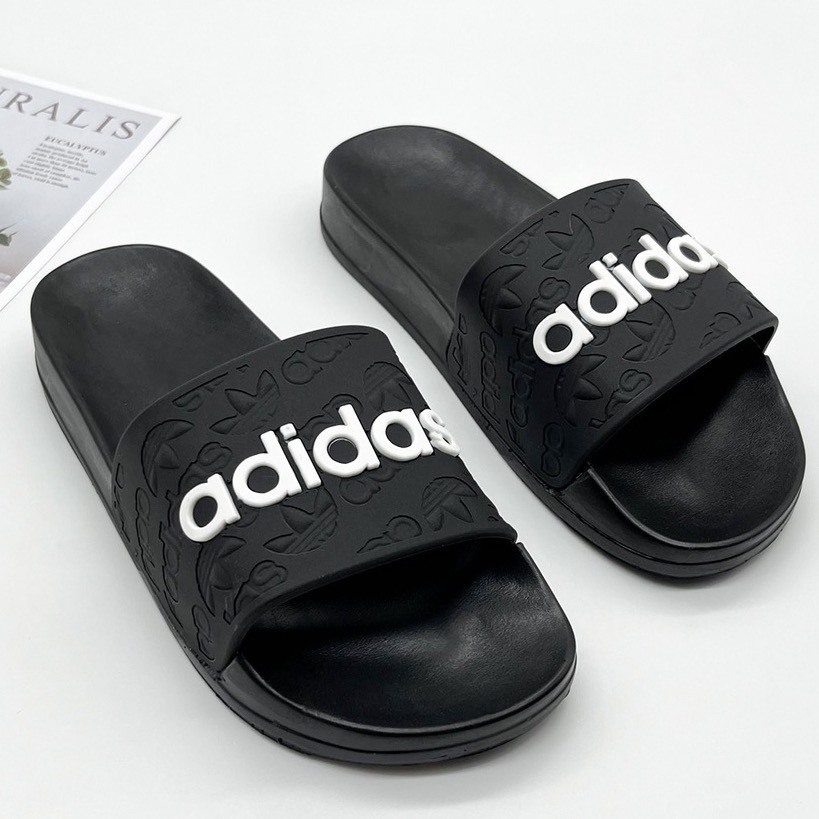 ADIDAS โฆษณา รองเท้าแตะสายไขว้สําหรับผู้ชายและผู้หญิง โลโก้ อาดิดาส นูนที่สายรัด พื้นบุกันลื่นสูง 3ซม.- ต้วนdp32