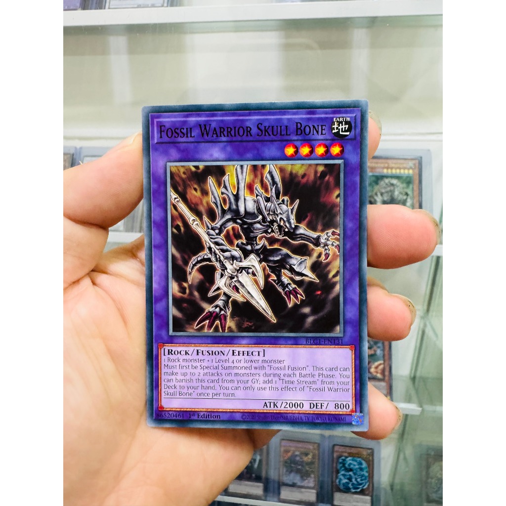 การ์ด Yugioh รหัส BLC1-EN131 - Fossil Warrior Skull Bone - ทั่วไป - รุ่นที่ 1