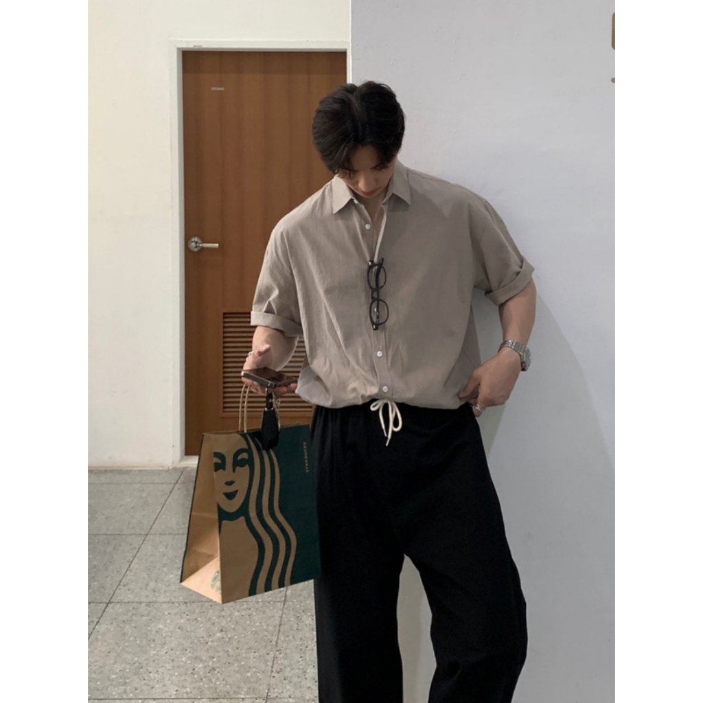 เสื้อเชิ้ตแขนสั้นผ้าลินินโบราณฟอร์ดผู้หญิงเกาหลีสีดําและสีขาวเสื้อเชิ้ตชายหาดแขนกุดหนา