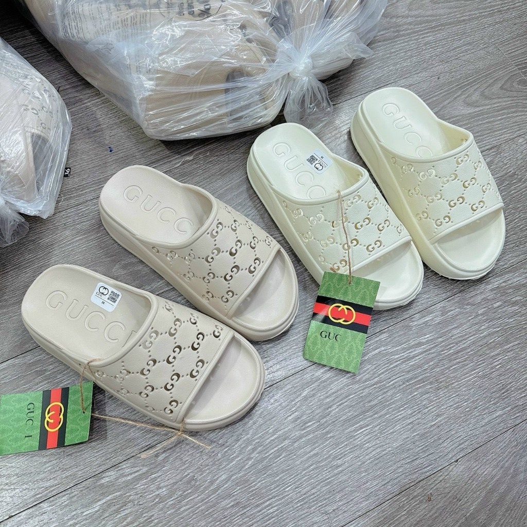 Guccii รองเท้าแตะผู้หญิง Perforated น้ําหนักเบายาง Sole 5 Molded Solid Eva Smooth ทุกขนาดรุ่นใหม่ รองเท้าแตะสายไขว้ผู้หญิงคุณภาพสูง