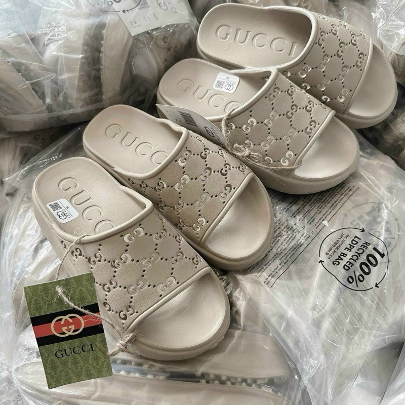 Guccii รองเท้าแตะผู้หญิง Perforated น้ําหนักเบายาง Sole 5 Molded Solid Eva Smooth ทุกขนาดรุ่นใหม่ รองเท้าแตะสายไขว้ผู้หญิงคุณภาพสูง