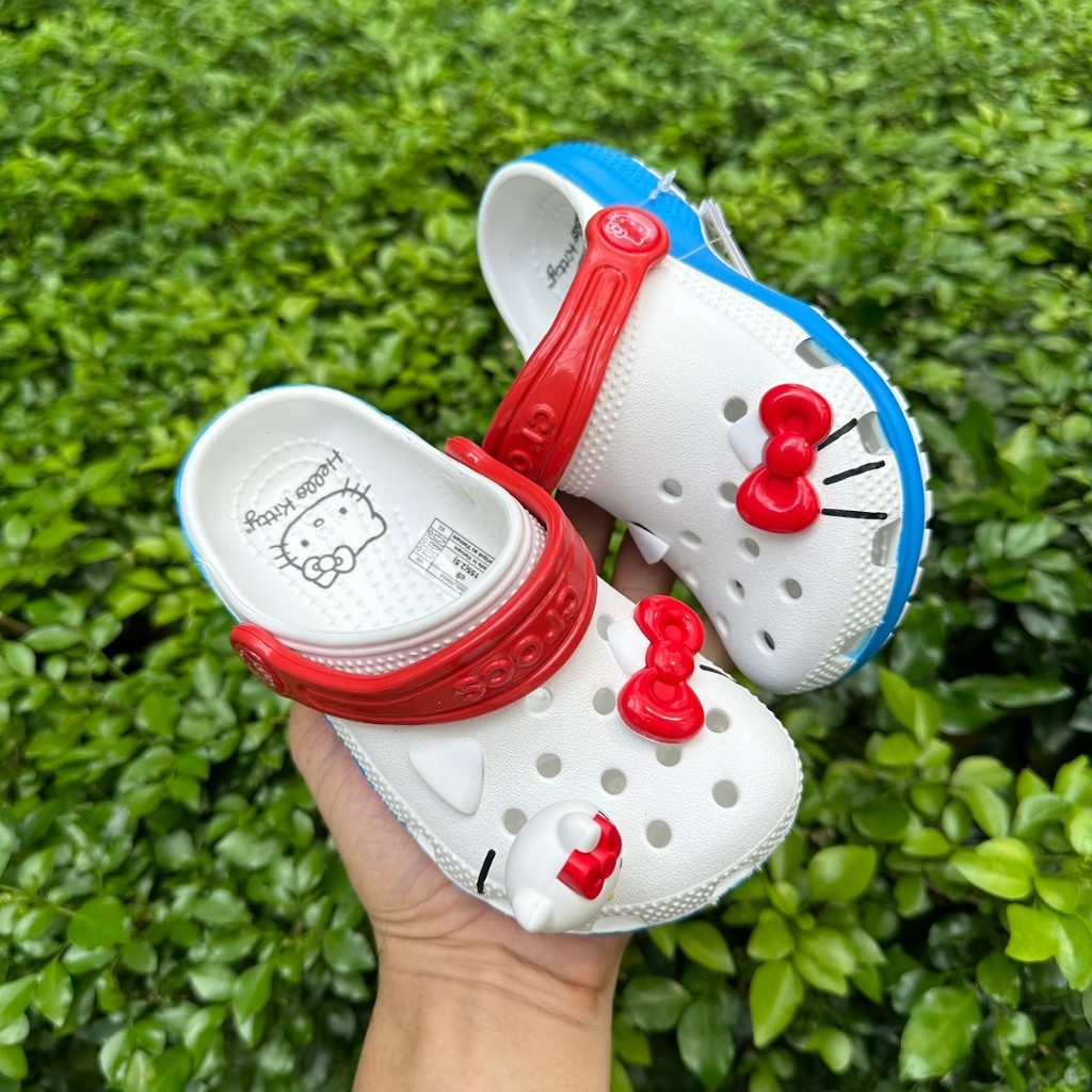 รองเท้าครอสเด็ก รองเท้า Cross Hello Kitty สําหรับเด็กผู้หญิงที่มีเครื่องรางแมว 3D น่ารัก