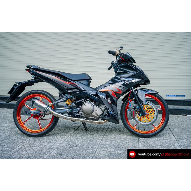 แสตมป์ X1R รุ่น R (โครเมียม) สีดําและสีส้ม
