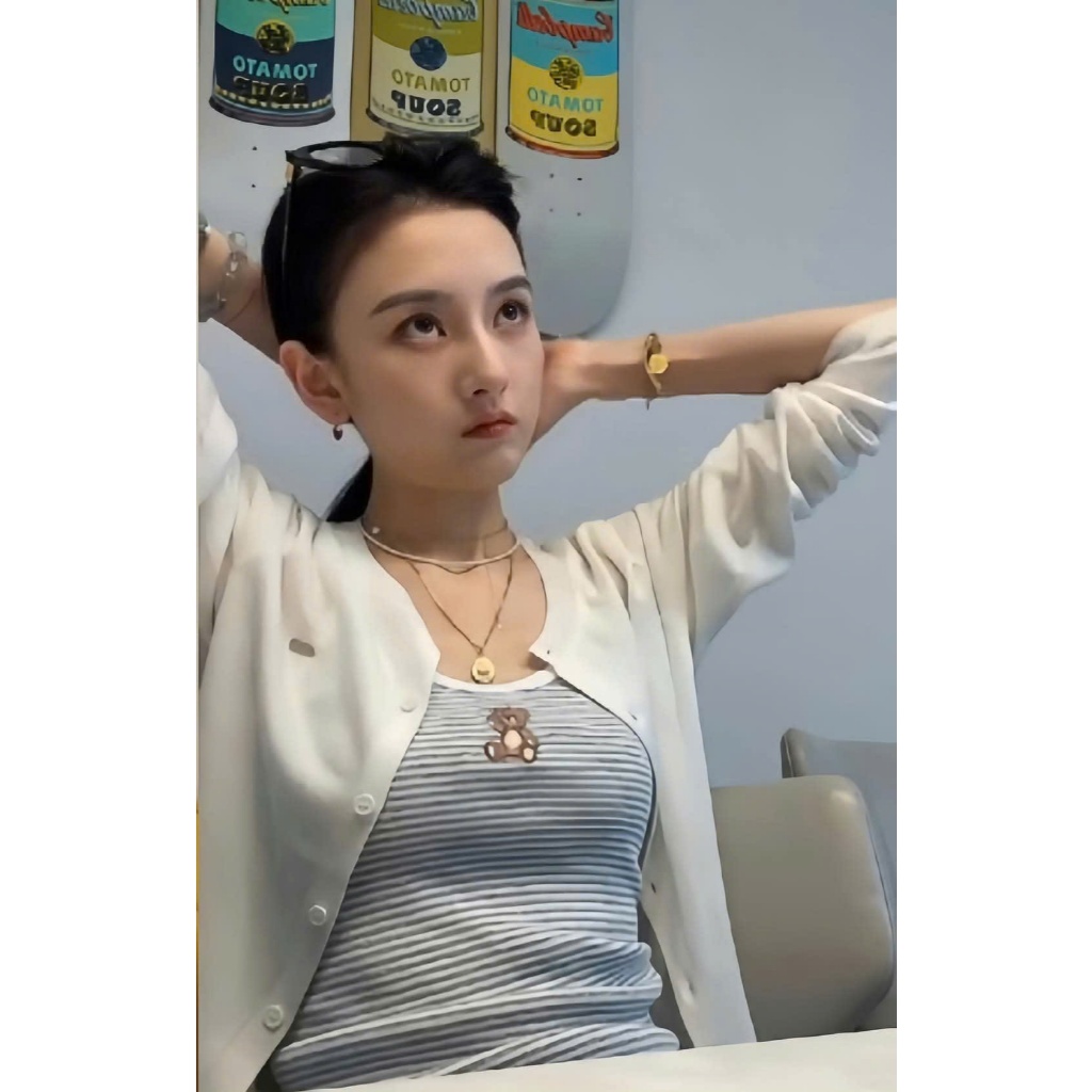 เสื้อกล้ามปักหมีของ Song Zuer Tong To Nhi .