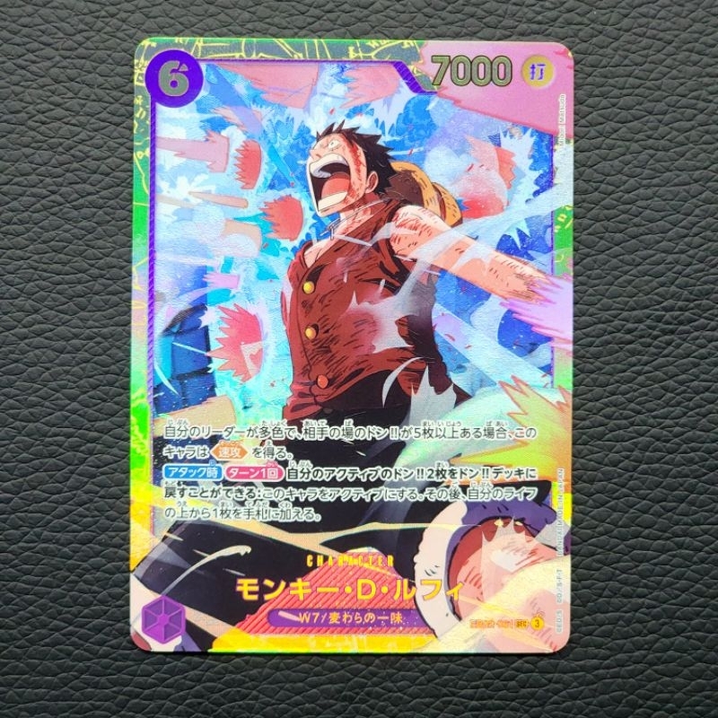 การ์ดวันพีซแท้ ลูฟี่ EB02-061 SEC - มาพร้อมแขนและปลอกการ์ด toploader.