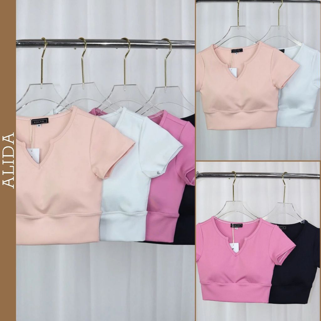 เสื้อครอปกีฬาพร้อมแผ่นรองหน้าอกในตัวสําหรับยิม, โยคะ, และวิ่งในยางยืด, ผ้าซับน้ําในหลายสี - ใช่