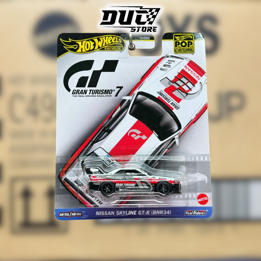 Ducstore รถโมเดล HKC28 Hot Wheels Premium Nissan Skyline GT-R (BNR34) R34 - 2025 Pop Culture