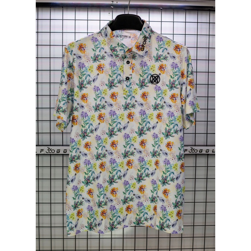 เสื้อกอล์ฟ Gfore ลายดอกหินโดดเด่น โลโก้ปักคม