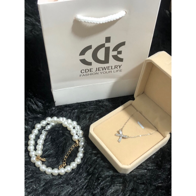 (ผ่านใหม่) สร้อยคอเงินผู้หญิงแบรนด์ LAMY CDE รูปโบว์และหิน