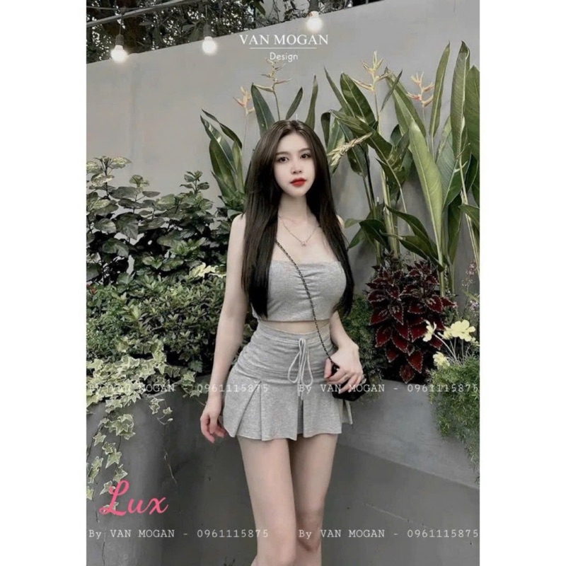 ชุดเซ็ตผู้หญิงเกาะอกเสื้อนมโตพร้อมกระโปรงสั้นจับจีบมีซับในด้านใน