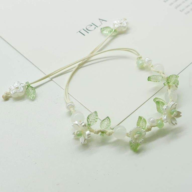 Tiela Accessories - กําไลข้อมือดอกไม้แฮนด์เมด