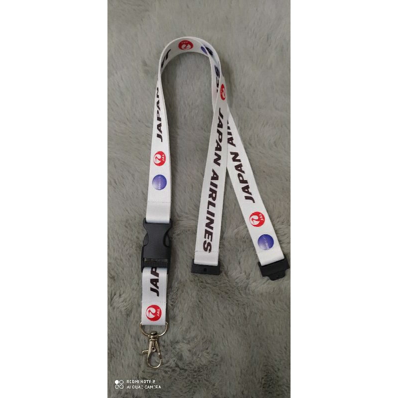 สายรัดสีขาว JAPAN AIRLINES