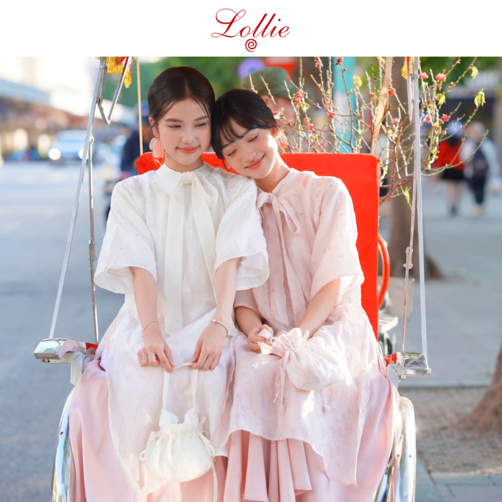 Bong Bong Tet ao dai พร้อมกระโปรงผ้าไหมเอวยางยืดสําหรับ Tet ในสีแอปริคอท TKA419 ผ้าไหมดีไซน์ระดับไฮเ