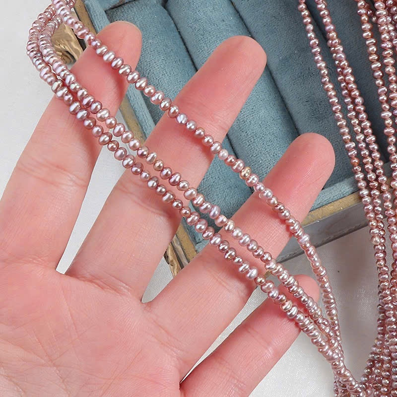 สร้อยคอมุกสีชมพูสีม่วงสีชมพู 3 มม. หรูหราพร้อมหัวเข็มขัด OT สีเงิน - Truong Thinh Pearl