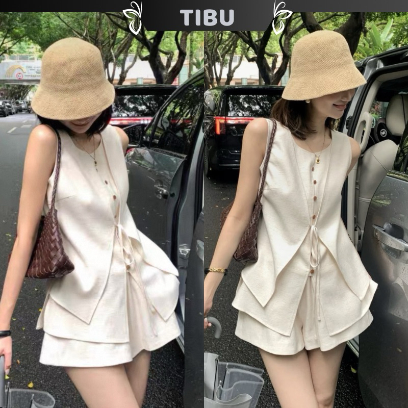 ชุดเสื้อกล้ามสายเดี่ยวผูกโบว์แฟนซีพร้อมชุดกางเกง ทิบู ของเสื้อผ้าสตรีหรูหราและสง่างามสีขาวสําหรับออกไปข้างนอกบนท้องถนน ข502