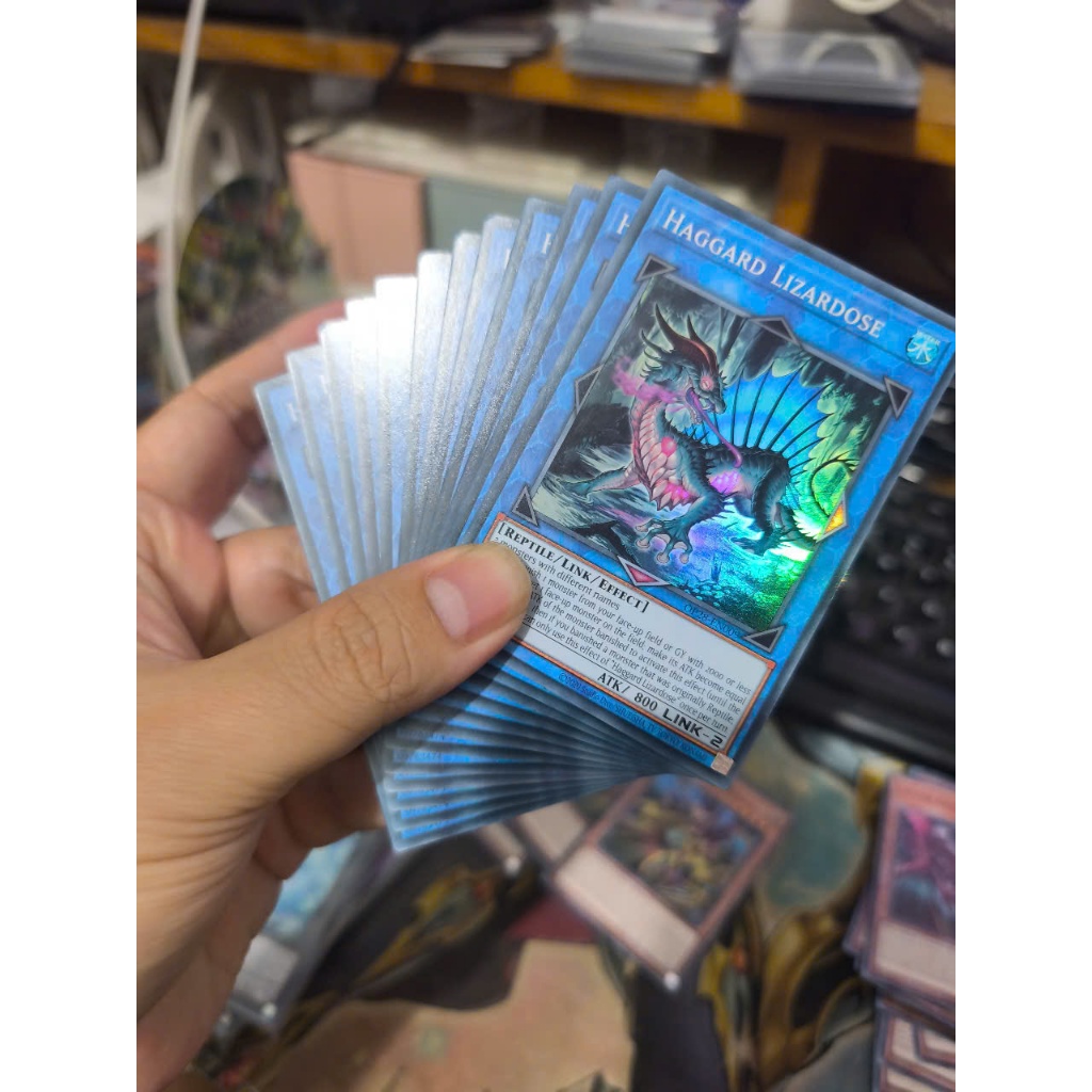 [Yugioh Funny Shop] การ์ด Haggard Lizardose 1 ใบ - OP28-EN009 - SUPER RARE UK