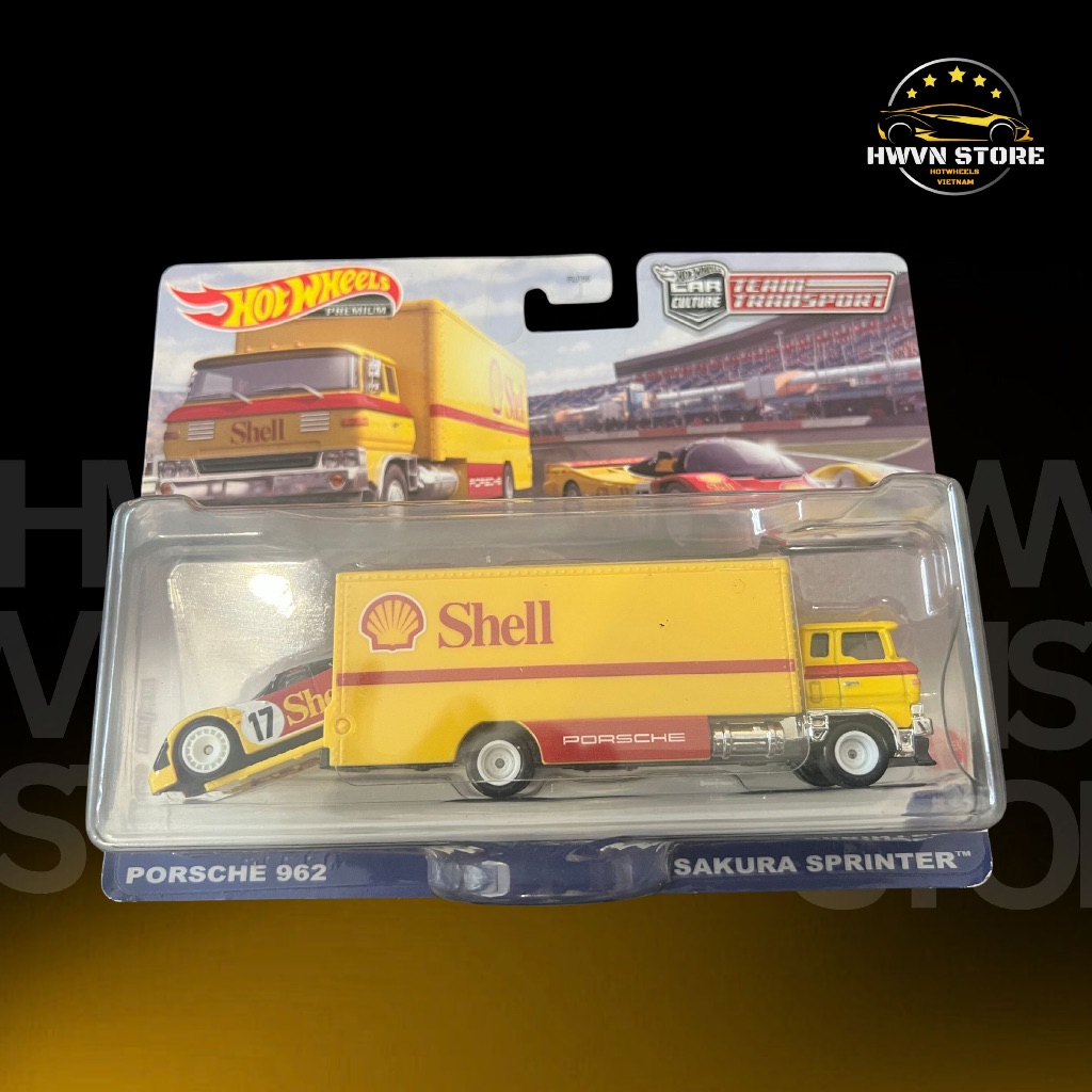 Hotwheels Team Transport Porsche 962 รถโมเดลสีเหลือง