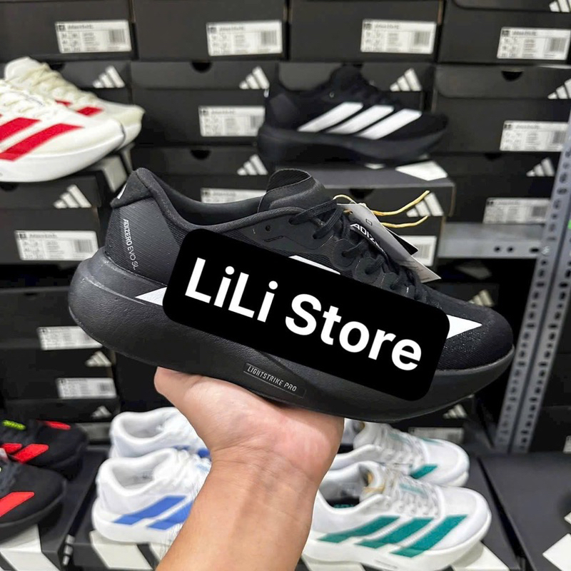 รองเท้าผ้าใบ Adizero Evo สีดําแถบสีขาว