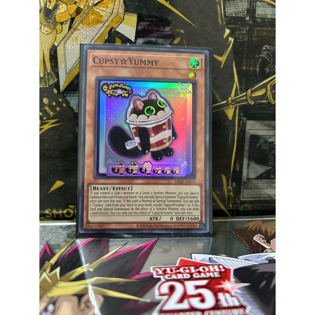 [ ถั่วลิสง - โปรดดูคําอธิบาย ] การ์ด Yugioh AE Cupsy?อร่อย (SR)