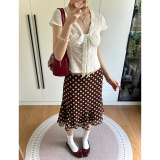 Chân váy hoạ tiết chấm bi dáng lửng xoè nhẹ lưng thấp màu nâu hottrend mididress