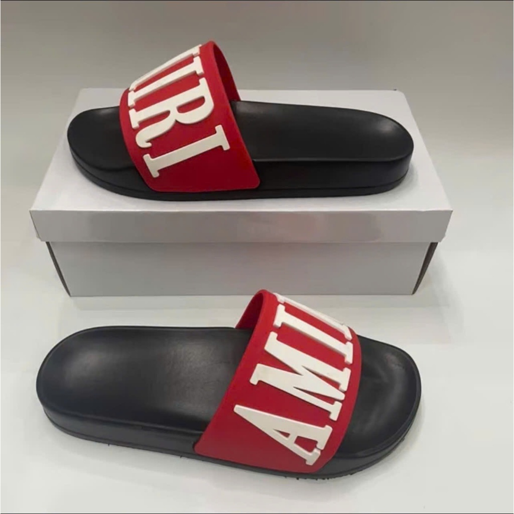 AMIRI รองเท้าแตะสายไขว้สําหรับผู้ชายและผู้หญิง รองเท้าแตะแฟชั่น Unisex สวยงาม hottrendd 2025 รุ่นสุด