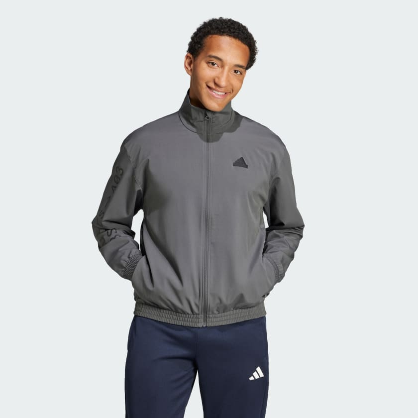 เสื้อแจ็คเก็ตผ้าทอ Adidas Brand Love - สีเทา - IW3548