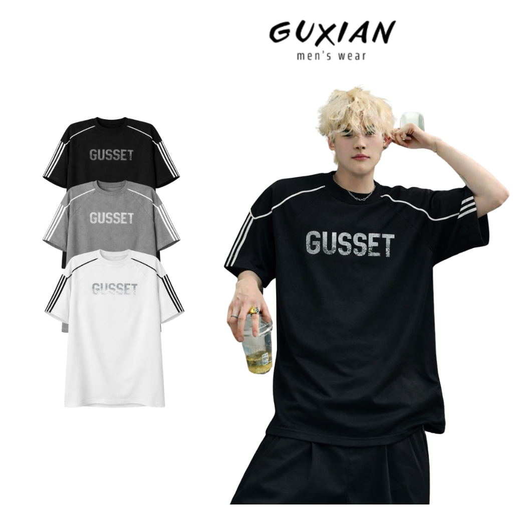 GUXIAN ผู้ชาย Oversize หลวม Format เสื้อยืดไหล่ลายบุคลิกภาพยืดหยุ่น Cool Unisex เสื้อคลุมง่าย Ap11