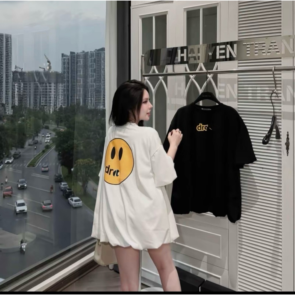 เสื้อยืดหน้ายิ้มผ้าฝ้ายสีเหลือง