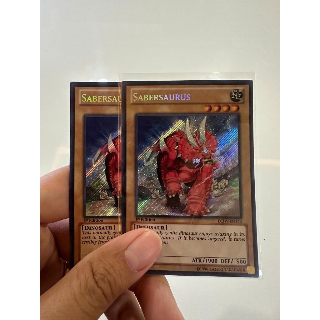 การ์ด YUGIOH ของแท้ (รูปแบบ Redu): Sabersaurus - LCJW-EN143 - Secret Rare