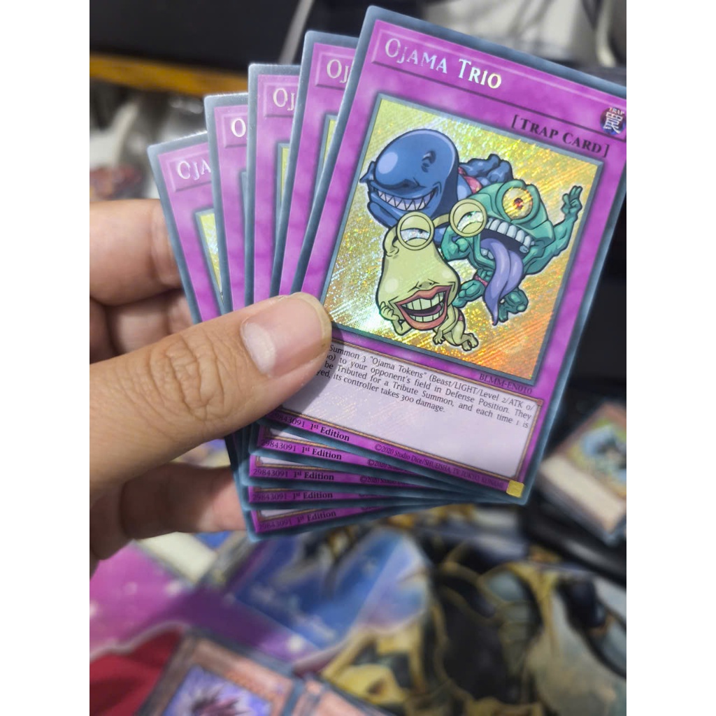 [Yugioh Funny Shop] การ์ด Ojama Trio 1 ใบ - BLMM-EN010 - Secret Rare 1st Edition