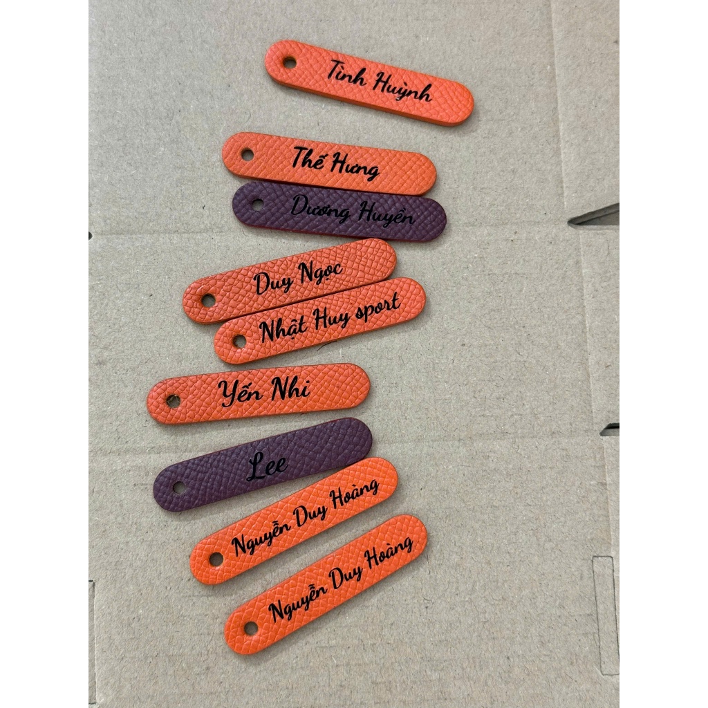 Name Tag มาพร้อมซองหนังใส่กุญแจ