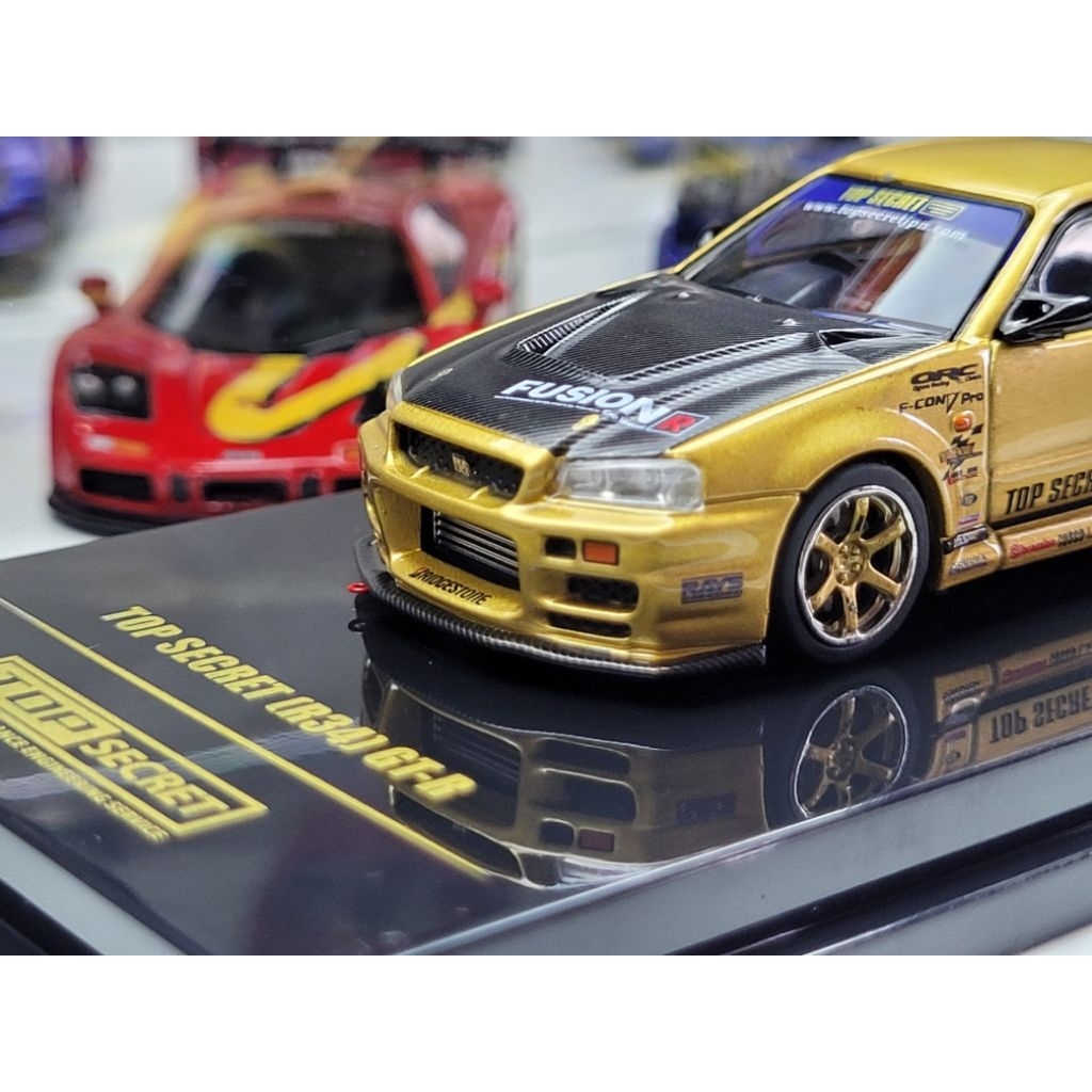 รุ่น Inno64 - Nissan Skyline R34 GT-R Top Secret Gold
